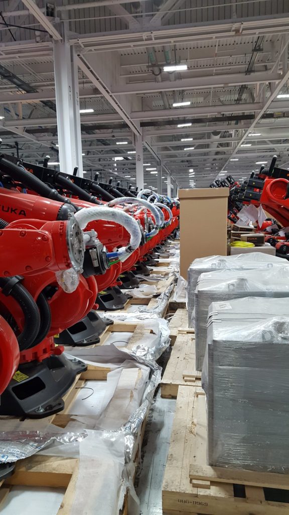 Kuka robots at the Tesla Fremont factory for Model 3 production start.