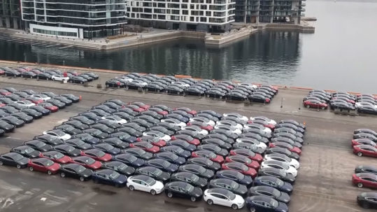 Shipment of Tesla Model 3 electric vehicles unload at the Port of Oslo, Norway.